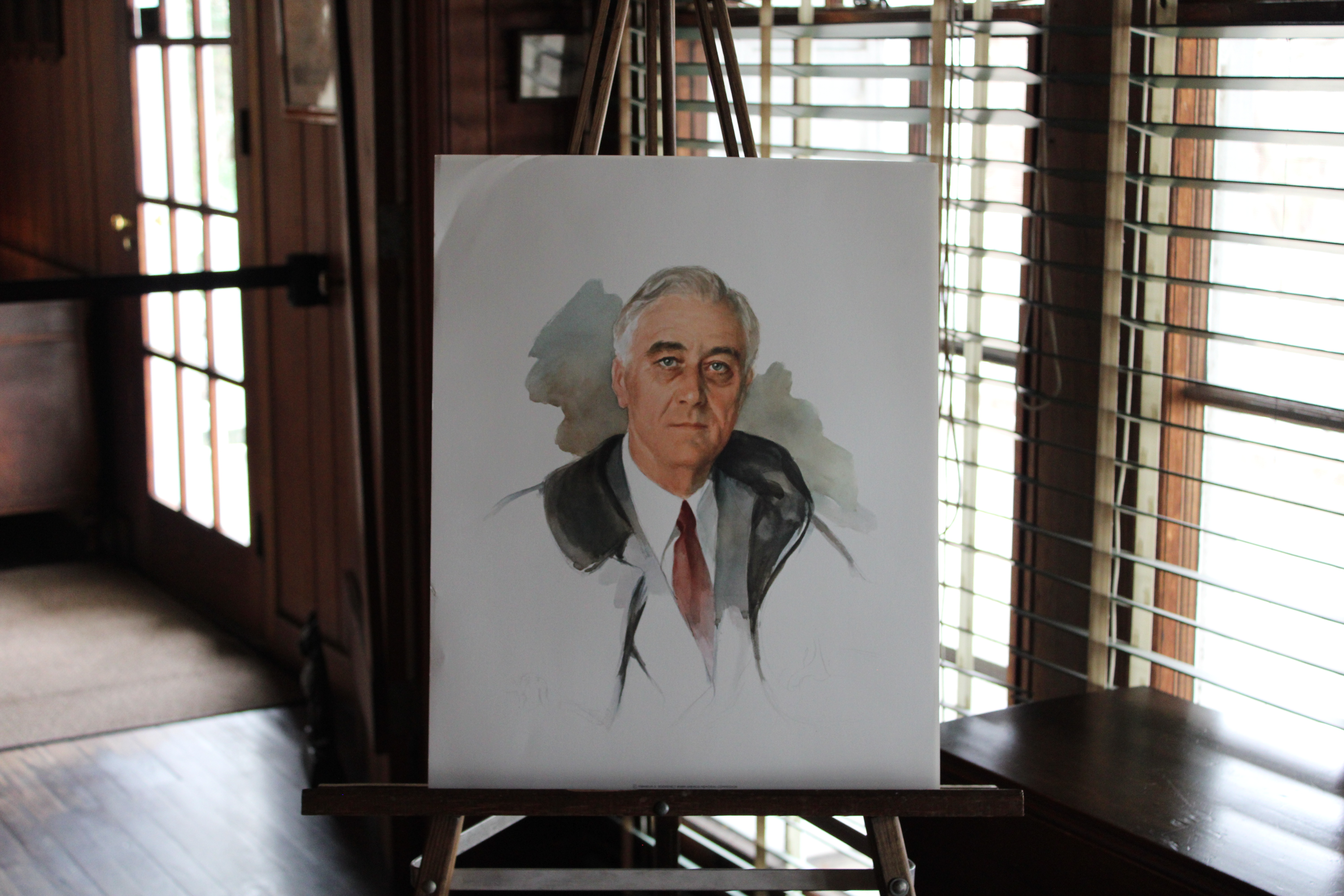 A replica of the unfinished portrait of FDR that sits within the living room of the main cottage